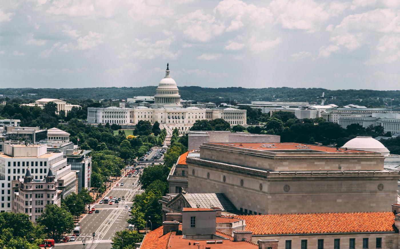 white domed government building by Vlad Tchompalov courtesy of Unsplash.