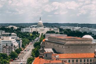 white domed government building by Vlad Tchompalov courtesy of Unsplash.